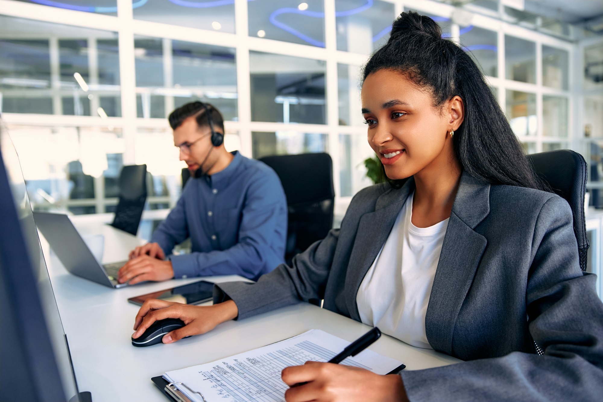 Call center staff. Freelancers in a coworking space.
